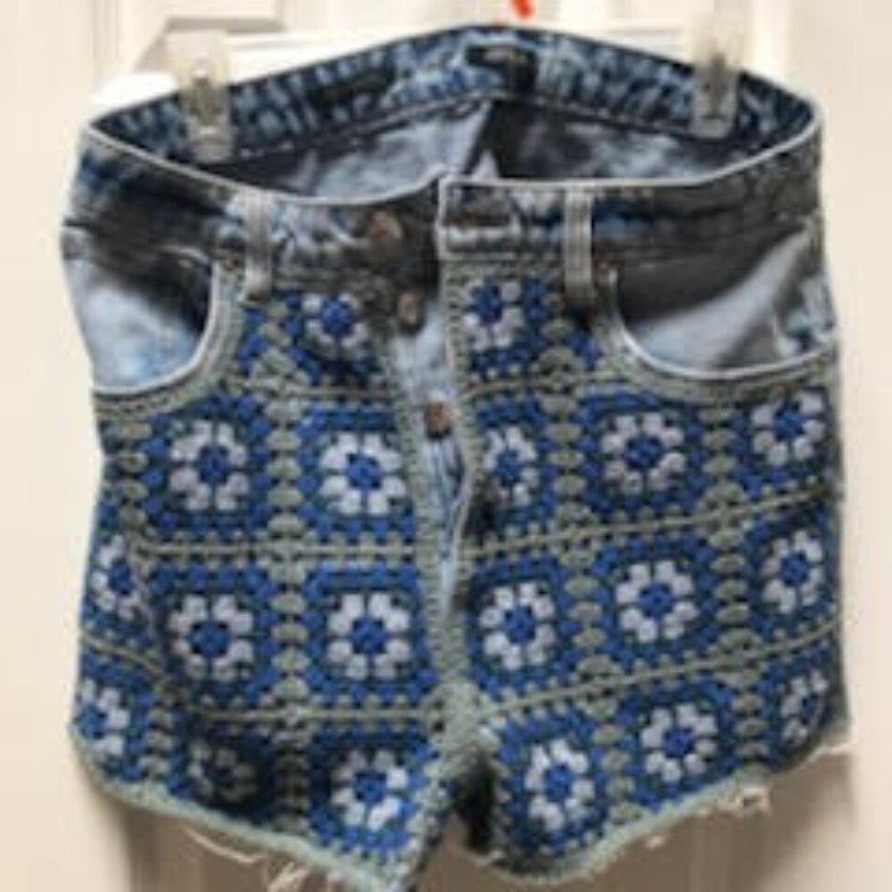 Very cute highest rise cutoff shorts with  crocheted patchwork.